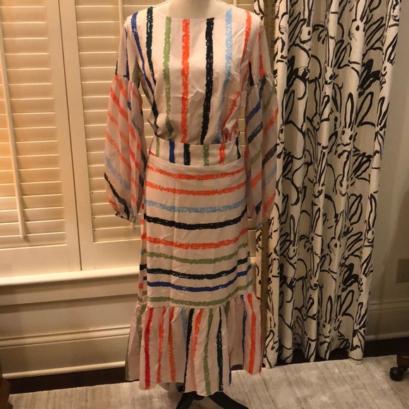 Meiconic Dresses & Skirts - Top and skirt with ruffle at hem and sheer sleeve